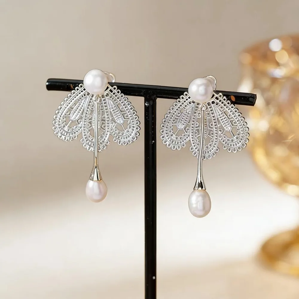 O1CN014MEofX2BaeFGG43ID_2214616708355-0-cib Vintage Pearl Lace Hollow Stud Earrings - Image 1