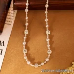 Manta Rose Zircon Saturn Long Necklace