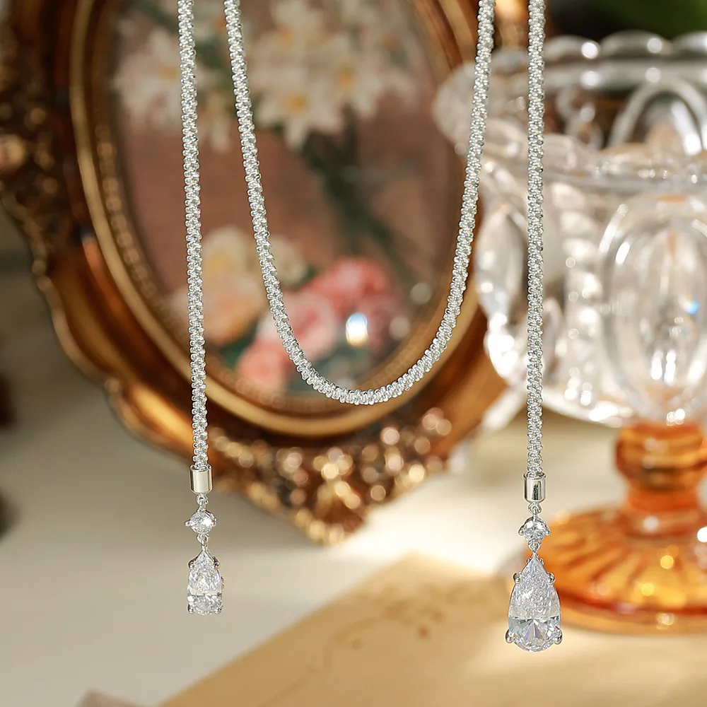 O1CN01GM28rwGLIbJ21stE_2214616708355-0-cib Long Tassel Teardrop Full Pave Clavicle Necklace - Image 1