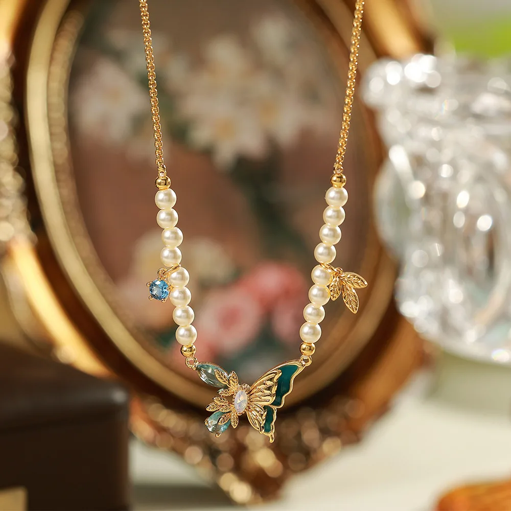O1CN01OHoTww2BaeHNR0V0x_2214616708355-0-cib Vintage Pearl Chain Enamel Butterfly Jewelry Set - Image 1