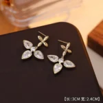 Zircon Star Hollow Saturn Stud Earrings