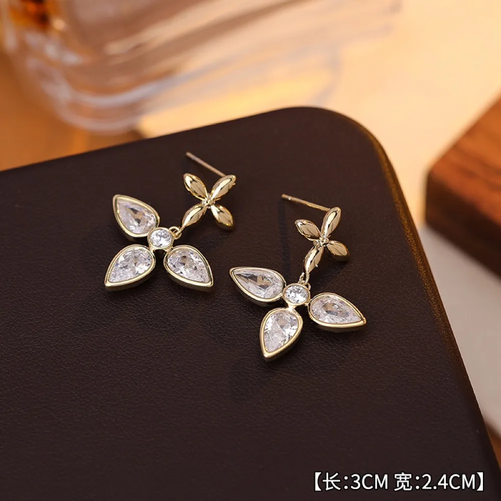 O1CN01kMRy4A2BaeBAaWFpX_2214616708355-0-cib Zircon Star Hollow Saturn Stud Earrings - Image 1