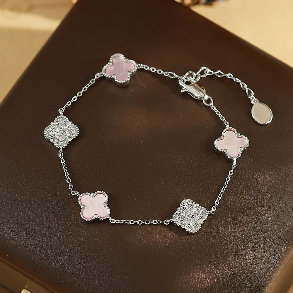 O1CN01pW6Qt52BaeHHq9agU_2214616708355-0-cib White Mother-of-Pearl Flower Four-Leaf Clover Bracelet - Image 1