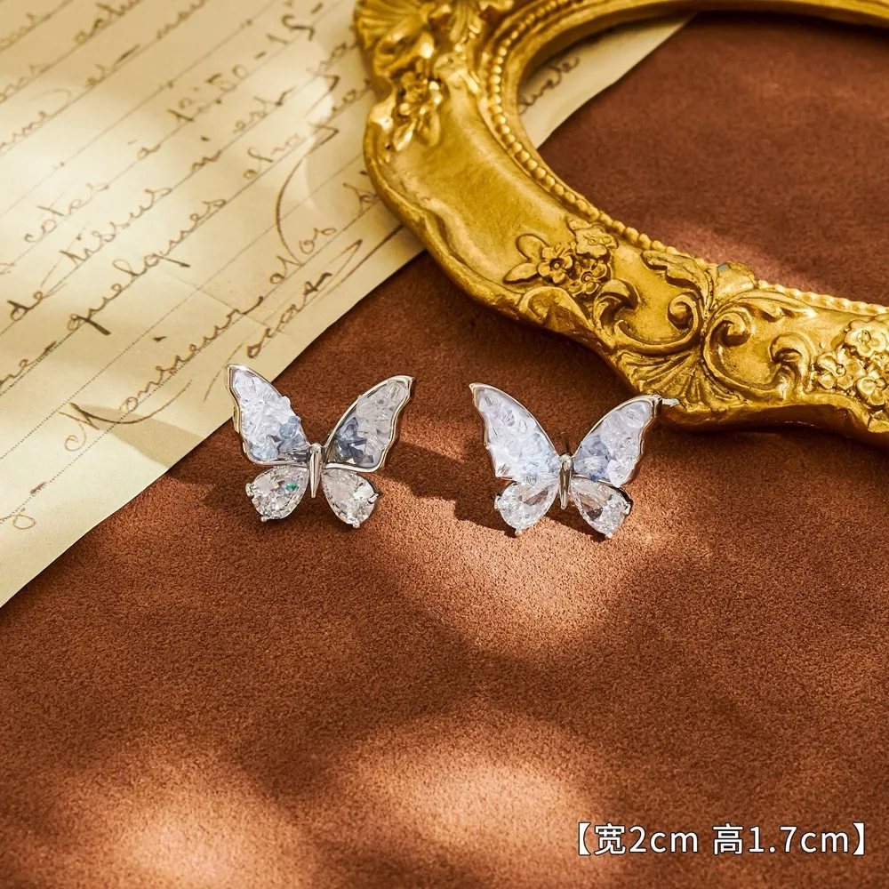 O1CN01rnVzXz2Bae5Yi67Cv_2214616708355-0-cib Neo-Chinese Pave Crystal Silver Butterfly Stud Earrings - Image 1