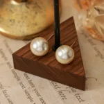 Mocha Mousse Snowflake Pearl Stud Earrings